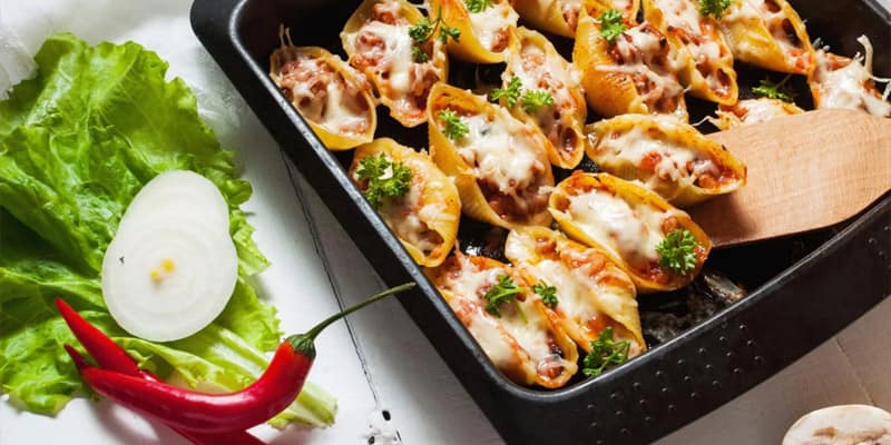Conchiglioni ripieni di funghi, prosciutto e besciamella (VIDEO RICETTA)